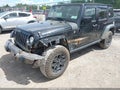 2017 Jeep Wrangler Unlimited — photo 2 of 16 | VIN 1C4HJWDGXHL535602