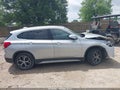 2018 BMW X1 — photo 12 of 15 | VIN WBXHU7C36J5L09310