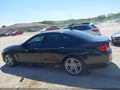 2013 BMW 5 Series — photo 14 of 16 | VIN WBAFU7C57DDU66907