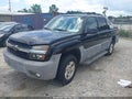 2002 Chevrolet Avalanche — photo 2 of 11 | VIN 3GNEK13T82G188221