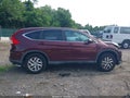 2015 Honda CR-V — photo 14 of 17 | VIN 2HKRM4H5XFH665325