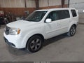 2015 Honda Pilot — photo 2 of 16 | VIN 5FNYF4H30FB069871