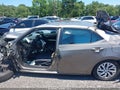 2018 Toyota Corolla — photo 13 of 15 | VIN 5YFBURHE7JP809097