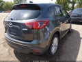 2013 Mazda CX-5 — photo 4 of 16 | VIN JM3KE4DE7D0159960