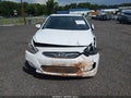 2014 Hyundai Accent — photo 13 of 17 | VIN KMHCU5AE3EU168736