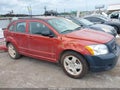 2009 Dodge Caliber — photo 14 of 18 | VIN 1B3HB48A39D206972