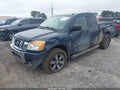 2015 Nissan Titan — photo 2 of 16 | VIN 1N6AA0CC9FN506331
