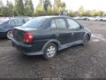 2000 Toyota Echo — photo 4 of 11 | VIN JTDBT1238Y0035989