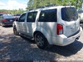 2010 Nissan Pathfinder — photo 3 of 13 | VIN 5N1AR1NB0AC621440