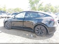 2025 Tesla Model Y — photo 13 of 15 | VIN 7SAYGDEEXSF297232