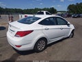 2015 Hyundai Accent — photo 4 of 16 | VIN KMHCT4AE2FU896613