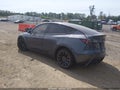 2022 Tesla Model Y — photo 3 of 18 | VIN 7SAYGDEF9NF448235