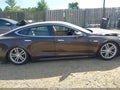 2013 Tesla Model S — photo 13 of 18 | VIN 5YJSA1DG5DFP04978