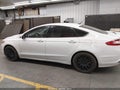 2015 Ford Fusion — photo 14 of 16 | VIN 3FA6P0H78FR304618