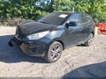 2014 Hyundai Tucson — photo 2 of 16 | VIN KM8JT3AF9EU896634