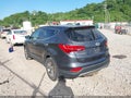 2016 Hyundai Santa Fe — photo 3 of 17 | VIN 5XYZTDLB4GG310465
