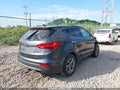 2016 Hyundai Santa Fe — photo 4 of 17 | VIN 5XYZTDLB4GG310465