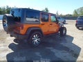 2011 Jeep Wrangler Unlimited — photo 4 of 11 | VIN 1J4BA3H12BL528350