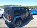 2010 Jeep Wrangler Unlimited — photo 4 of 13 | VIN 1J4BA3H15AL233094