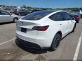 2022 Tesla Model Y — photo 4 of 15 | VIN 7SAYGDEEXNF362553