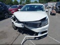 2016 Volkswagen Passat — photo 12 of 16 | VIN 1VWAT7A32GC026313