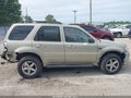 2006 Mercury Mariner — photo 13 of 16 | VIN 4M2YU56176DJ09555