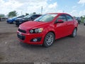 2014 Chevrolet Sonic — photo 2 of 16 | VIN 1G1JC5SH3E4181955