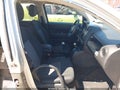 2014 Jeep Compass — photo 5 of 11 | VIN 1C4NJCBA7ED542397