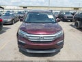 2016 Honda Pilot — photo 13 of 17 | VIN 5FNYF5H53GB033844