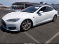 2014 Tesla Model S — photo 2 of 18 | VIN 5YJSA1H19EFP56458