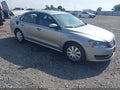 2013 Volkswagen Passat — photo 1 of 11 | VIN 1VWAP7A30DC041618