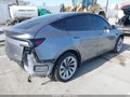 2026 Tesla Model Y — photo 4 of 19 | VIN 7SAYGDEE4TF354669