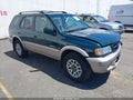 2001 Honda Passport — photo 1 of 16 | VIN 4S6DM58W214412753