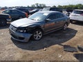 2014 Volkswagen Passat — photo 2 of 16 | VIN 1VWAT7A37EC022240