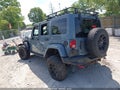 2015 Jeep Wrangler Unlimited — photo 3 of 22 | VIN 1C4BJWFGXFL548737