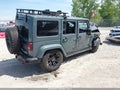 2015 Jeep Wrangler Unlimited — photo 4 of 22 | VIN 1C4BJWFGXFL548737
