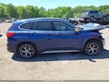 2017 BMW X1 — photo 13 of 17 | VIN WBXHT3C36H5F87035