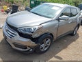 2017 Hyundai Santa Fe — photo 2 of 16 | VIN 5NMZTDLB5HH015687
