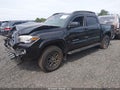 2018 Toyota Tacoma — photo 2 of 17 | VIN 5TFAZ5CN8JX070594
