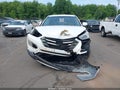 2014 Hyundai Santa Fe — photo 12 of 16 | VIN 5XYZT3LBXEG163818