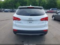 2014 Hyundai Santa Fe — photo 16 of 16 | VIN 5XYZT3LBXEG163818