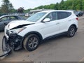 2014 Hyundai Santa Fe — photo 2 of 16 | VIN 5XYZT3LBXEG163818