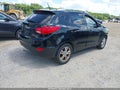 2010 Hyundai Tucson — photo 4 of 12 | VIN KM8JU3AC9AU113941