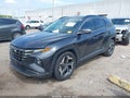 2022 Hyundai Tucson — photo 2 of 16 | VIN 5NMJE3AE0NH054939