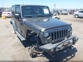 2017 Jeep Wrangler — photo 1 of 16 | VIN 1C4AJWAG2HL654864