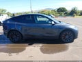 2022 Tesla Model Y — photo 14 of 19 | VIN 7SAYGDEF8NF407739