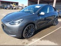 2022 Tesla Model Y — photo 2 of 19 | VIN 7SAYGDEF8NF407739