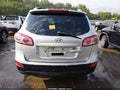 2012 Hyundai Santa Fe — photo 16 of 18 | VIN 5XYZH4AG9CG098818