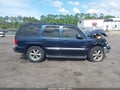 2004 GMC Yukon — photo 13 of 16 | VIN 1GKEC13Z54R180997