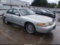 1999 Ford Crown Victoria — photo 1 of 22 | VIN 2FAFP74W8XX215270